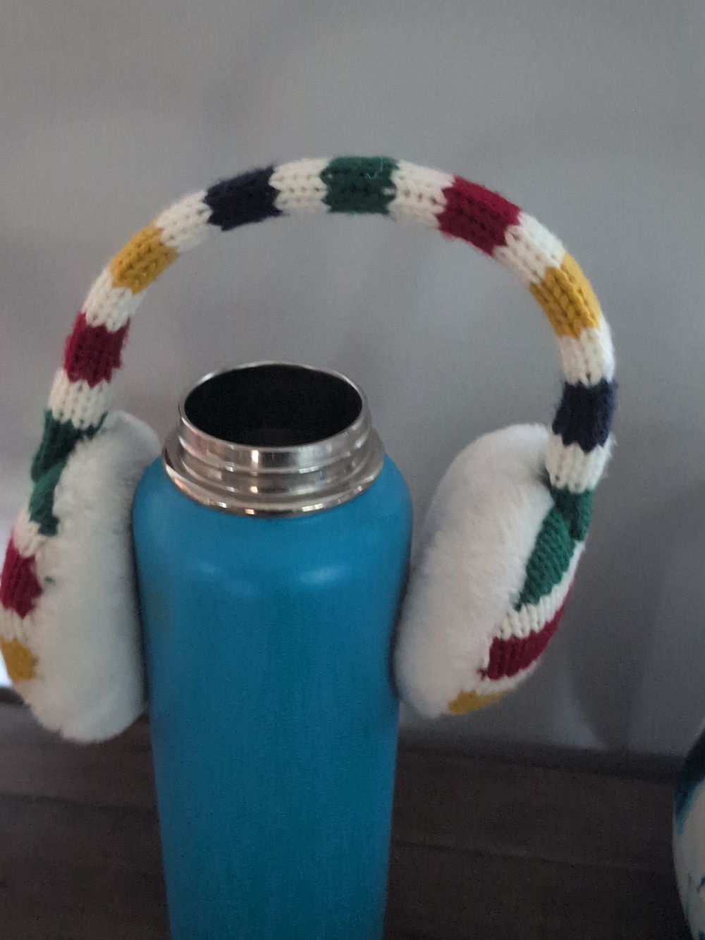 Cozy Multicolor HBC Knit Ear Muffs with White Plush Pads